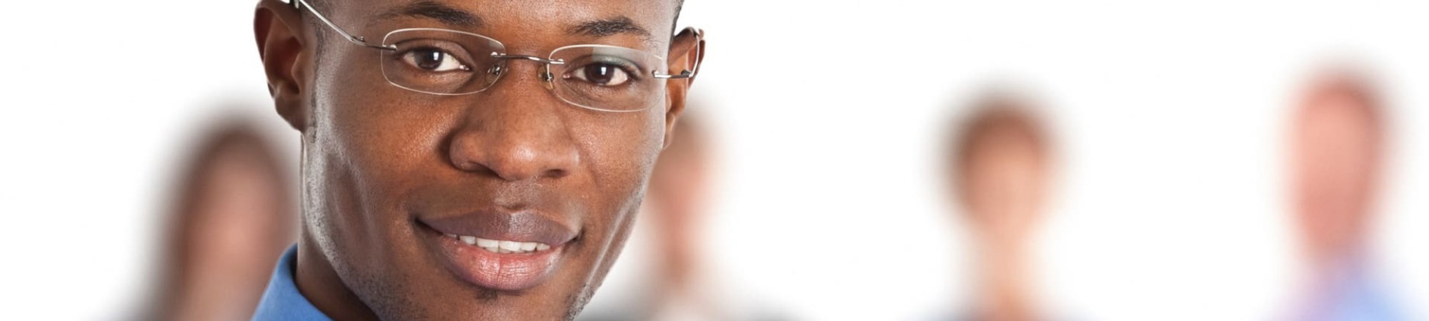 Portrait of a businessman in standing front of his team